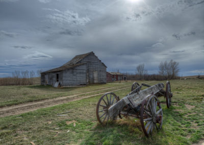 Old Wagon at abandoned farm yard saskatchewan